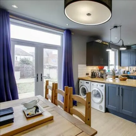 Buy this 4 bed house on Wilfrid Gardens in London, W3 0NH