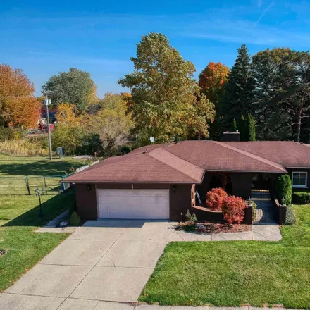 Buy this 3 bed house on 39908 Donahue Drive in Clinton Township, MI 48038
