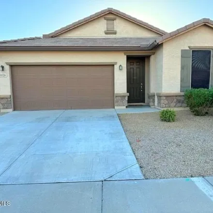Rent this 3 bed house on 1026 North 169th Avenue in Goodyear, AZ 85338