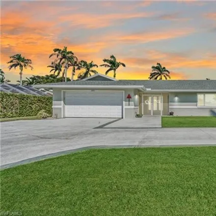 Buy this 4 bed house on 2870 Leeward Ln in Naples, Florida