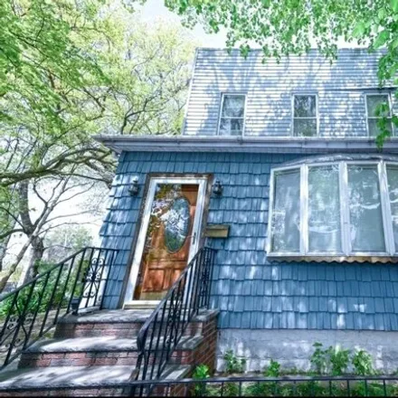 Buy this 4 bed house on 72-27 Indiana Avenue in New York, NY 11385