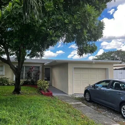 Buy this 3 bed house on 1827 Southwest 43rd Avenue in Broadview Park, Broward County