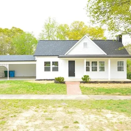 Buy this 4 bed house on 275 East Washington Avenue in Bessemer City, NC 28016