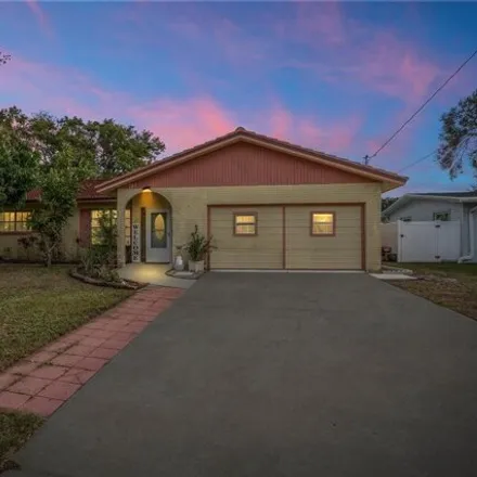 Buy this 4 bed house on 787 San Salvador Drive in Dunedin, FL 34698