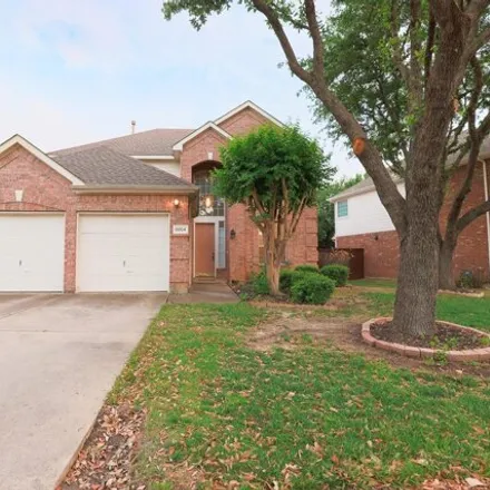 Rent this 4 bed house on 9804 Hickory Hollow Lane in Irving, TX 75063