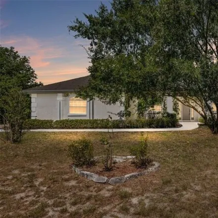 Buy this 3 bed house on 6796 NE 61st Avenue Rd in Silver Springs, Florida
