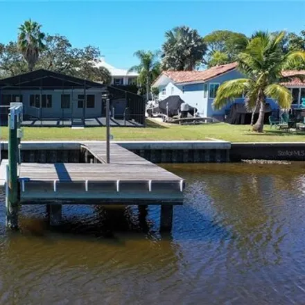 Buy this 4 bed house on 824 Bayshore Drive in Tarpon Springs, FL 34689