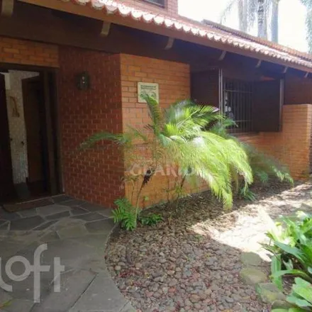 Buy this 3 bed house on Avenida Arlindo Pasqualini in Jardim Isabel, Porto Alegre - RS