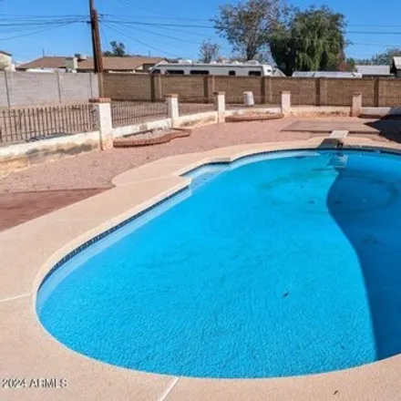 Buy this 4 bed house on 6644 East Princess Drive in Mesa, AZ 85205