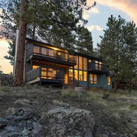 Buy this 3 bed house on 4766 Forest Hill Road in Evergreen, CO 80439
