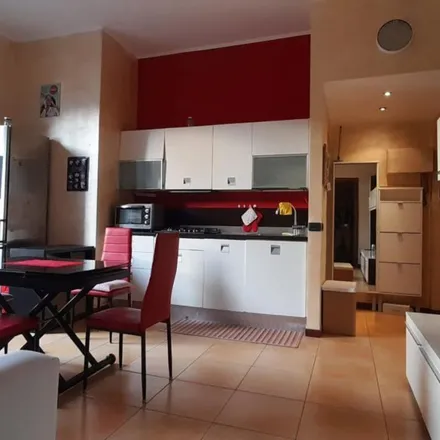 Rent this 1 bed apartment on The Different Burger in Via Giambellino, 20146 Milan MI
