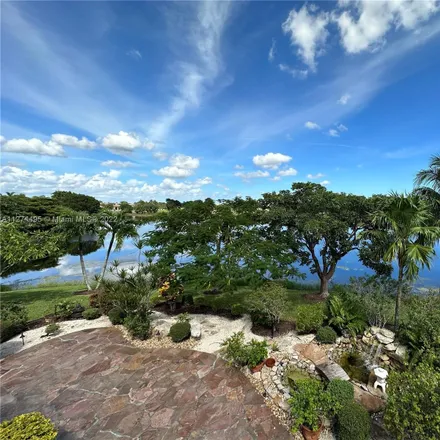 Image 3 - 12401 Northwest 62nd Court, Coral Springs, FL 33076, USA - House for sale
