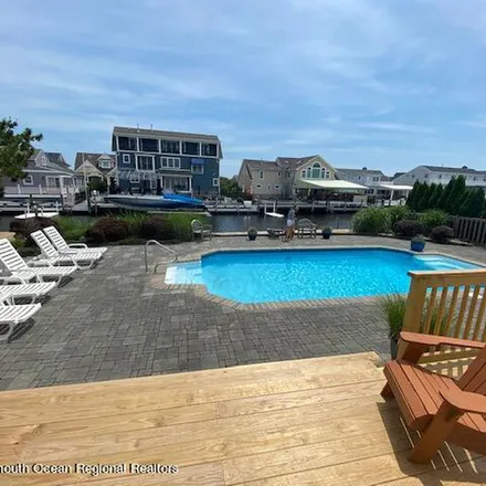 Rent this 5 bed apartment on 124 Pointe Drive in Mantoloking Shores, Brick Township
