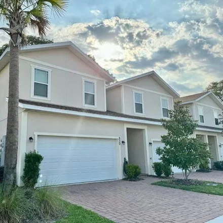 Rent this 3 bed townhouse on 930 Grand Highway in Clermont, FL 32711
