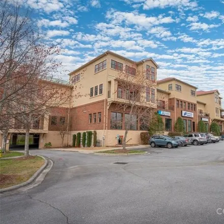 Buy this 2 bed condo on Harpe Aesthetics + Wellness in 475 South Church Street, Willow Bend