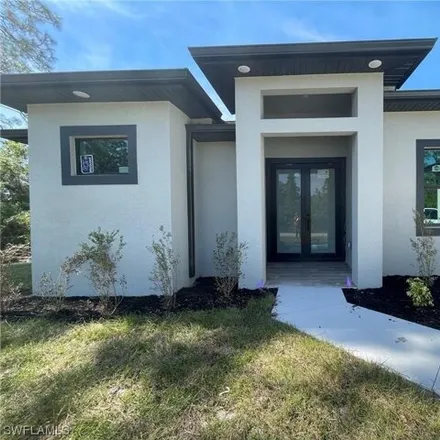 Buy this 4 bed house on 629 Moore Avenue in Lehigh Acres, FL 33972
