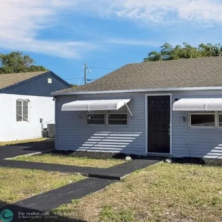 Buy this 2 bed house on 874 West 1st Street in Riviera Beach, FL 33404