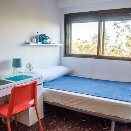 Rent this 6 bed apartment on Plaça del Poeta Vicente Gaos in 46021 Valencia, Spain