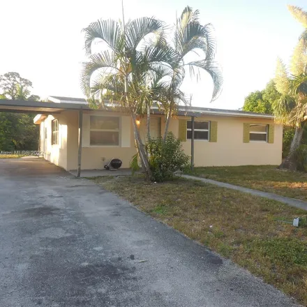 Buy this 4 bed house on Zip in Media Productions in LLC - Video Production Fort Lauderdale, 1 East Broward Boulevard
