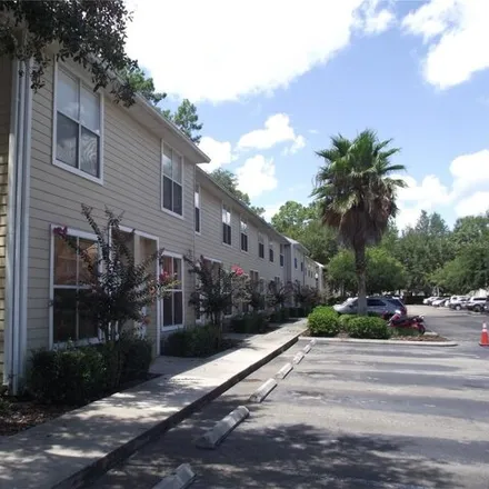 Rent this 2 bed townhouse on Kensington South Apartments in Southwest 20th Avenue, Gainesville