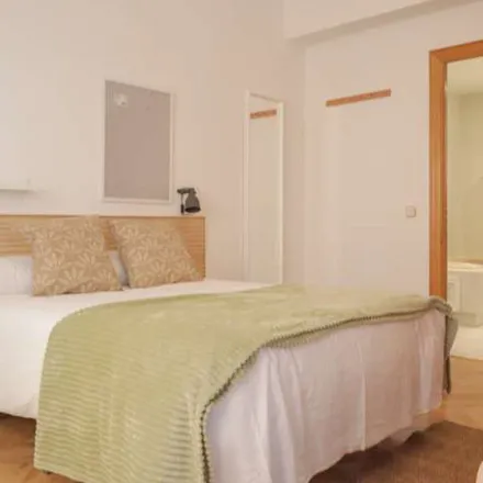 Rent this 9 bed apartment on Calle de Joaquín María López in 32, 28015 Madrid