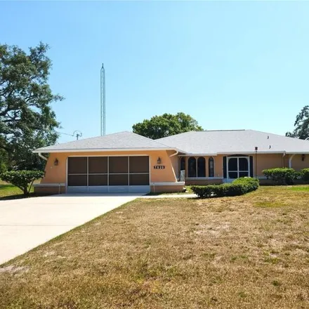 Buy this 3 bed house on 7622 Holiday Drive in Spring Hill, FL 34606