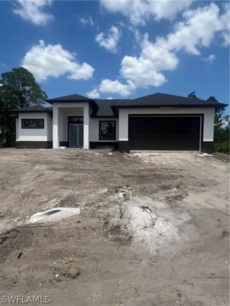 Buy this 3 bed house on 1870 West 9th Street in Lehigh Acres, FL 33972