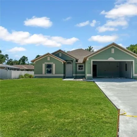 Buy this 3 bed house on 5819 Rhapsody Avenue in North Port, FL 34288