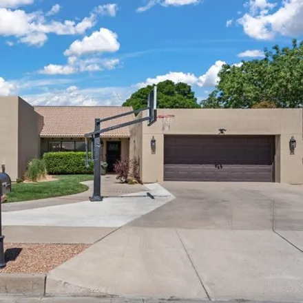 Buy this 4 bed house on Lowell Street Northeast in Prospectors Ridge, Albuquerque