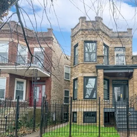 Buy this 6 bed house on 3217 West Warner Avenue in Chicago, IL 60618