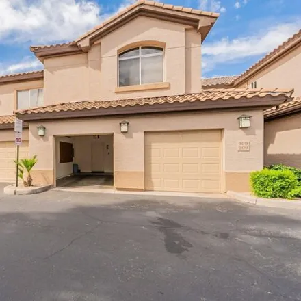 Buy this 2 bed house on Superstition Springs Golf Course in 6542 East Baseline Road, Mesa