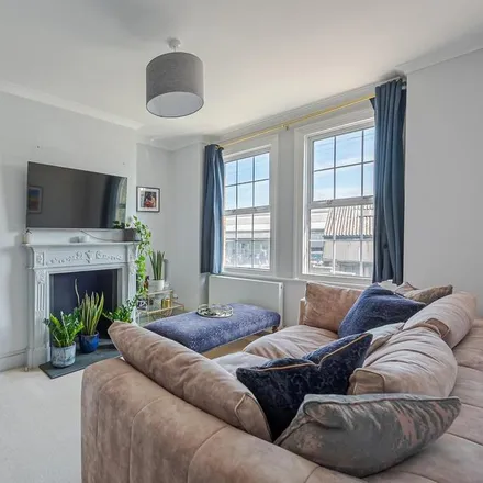 Rent this 3 bed apartment on Silverthorne Road in London, SW8 3BA