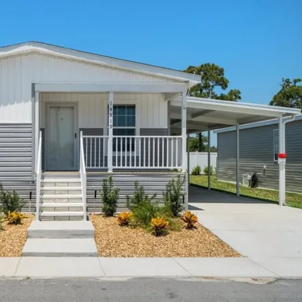 Buy this studio apartment on 23 Cypress in the Wood in Port Orange, FL 32129