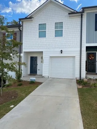 Rent this 3 bed townhouse on 2998 Heritage Villas Drive in Stonecrest, GA 30038