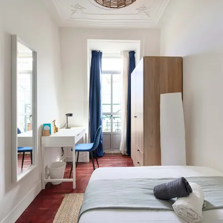 Rent this 8 bed room on Rua Francisco Sanches 45 in 1170-141 Lisbon, Portugal