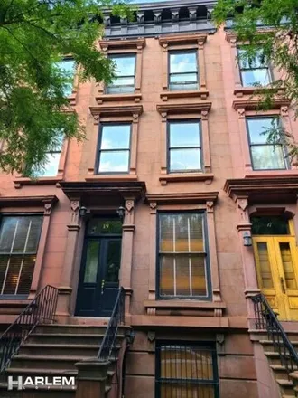 Buy this 5 bed townhouse on 19 West 123rd Street in New York, NY 10027