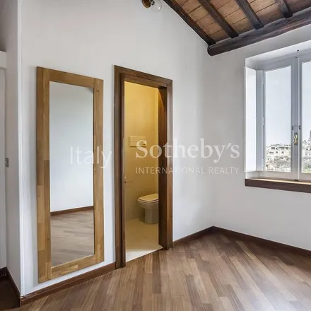 Rent this 3 bed apartment on Via del Colosseo 16 in 00184 Rome RM, Italy
