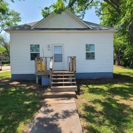 Buy this 3 bed house on 702 W 4th St in Wellington, Kansas