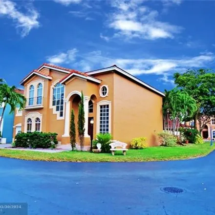 Rent this 4 bed house on 10892 Nw 51st Trl in Doral, Florida