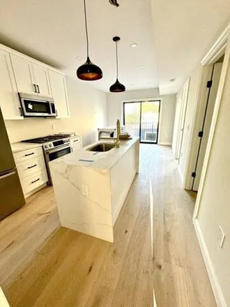 Rent this 4 bed apartment on 48 Woodward Street in Boston, MA 01125