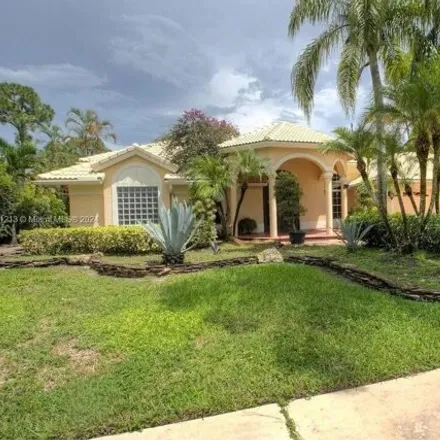 Buy this 4 bed house on 892 Cedar Cove Rd in Wellington, Florida