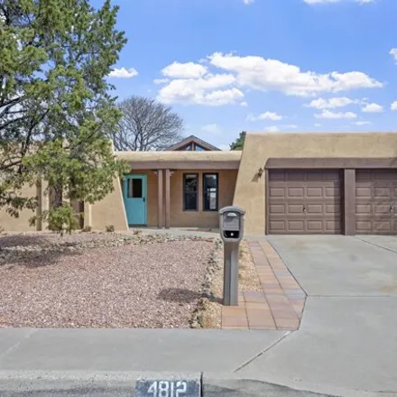 Buy this 4 bed house on 4866 Brookwood Street Northeast in Albuquerque, NM 87109