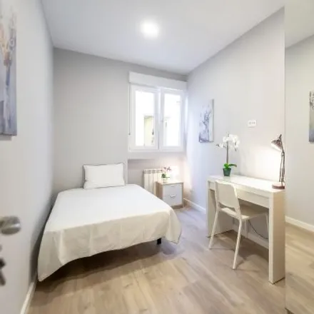 Rent this 2 bed room on Calle del Puerto de Canfranc in 5, 28038 Madrid