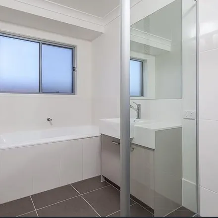 Rent this 4 bed apartment on 101 Park Vista Drive in Mango Hill QLD 4509, Australia