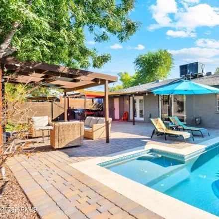 Rent this 3 bed house on 1126 West Orange Drive in Phoenix, AZ 85013