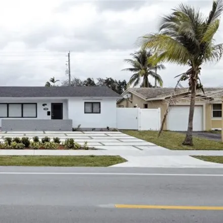 Buy this 3 bed house on 4911 Washington Street in Hollywood, FL 33021