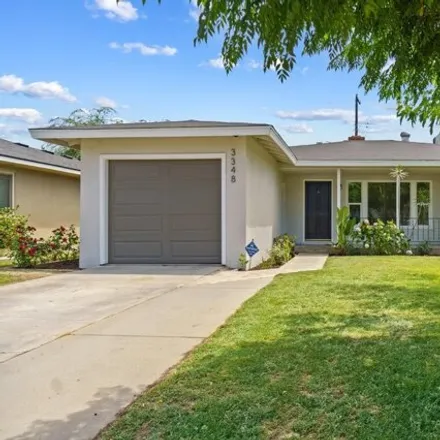 Buy this 3 bed house on 3348 E Harvard Ave in Fresno, California