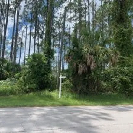 Image 1 - 76 Rickenbacker Drive, Palm Coast, FL 32164, USA - House for sale