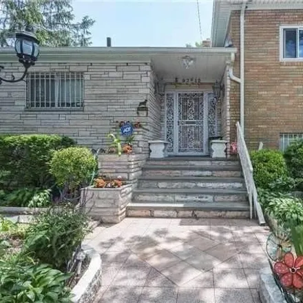 Buy this 4 bed house on 97-12 23rd Avenue in New York, NY 11369