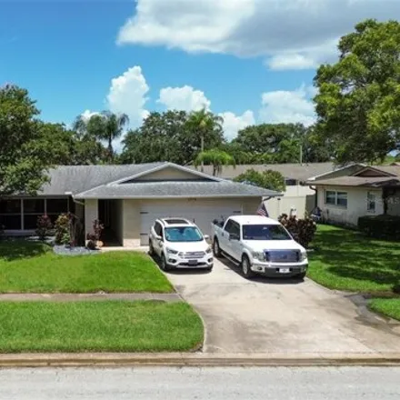 Buy this 3 bed house on 1974 Arvis Cir W in Clearwater, Florida